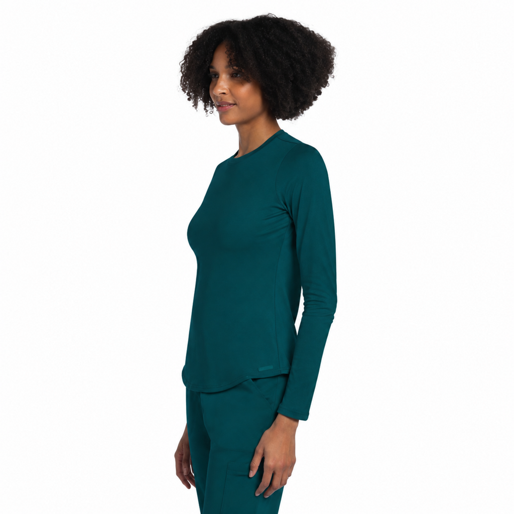 Blusa médica de manga larga Cherokee CK773 para mujer color Azul Caribe, vista lateral